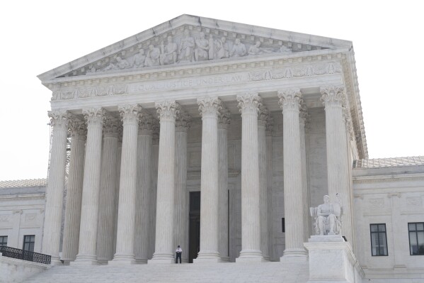 FILE - The Supreme Court is seen on June 30, 2023, in Washington. Charles and Kathleen Moore are about to have their day in the Supreme Court over a $15,000 tax bill they believe is unconstitutional. The Redmond, Wash., couple claim they had to pay the money because of their investment in an Indian company from which, as Charles Moore, 62, said in a sworn statement, they “have never received a distribution, dividend, or other payment.” But significant parts of the story they have told to reach this point seem at odds with public records. (AP Photo/Jacquelyn Martin, File)