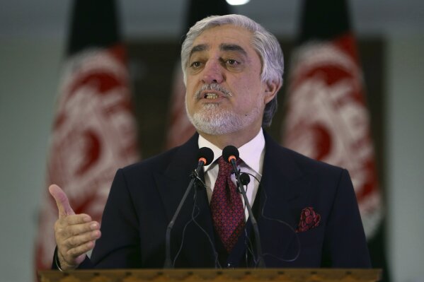 FILE - In this Feb. 29, 2020, file photo, Afghan Chief Executive Officer Abdullah Abdullah speaks during a news conference in Kabul, Afghanistan. Squabbling Afghan presidential rivals threatened to declare themselves president in dueling ceremonies Monday, March 9, 2020, throwing plans for intra-Afghan negotiations into chaos. (AP Photo/Tamana Sarwary, File)
