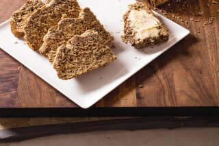
              This undated photo provided by America's Test Kitchen in March 2019 shows Irish brown soda bread displayed in Boston. This recipe appears in the cookbook "All-Time Best Brunch." (Carl Tremblay/America's Test Kitchen via AP)
            