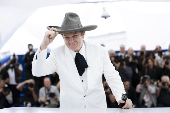 John C. Reilly poses for photographers in the photo call for the film 'Heads or Tails?' At the 78th International Film Festival, Cannes, southern France, Thursday, May 22, 2025.
