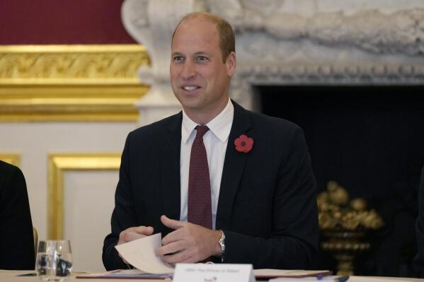 FILE - Britain's Prince William smiles as he attends a Tusk Conservation symposium at St James's Palace in London, Wednesday, Nov. 2, 2022. A bubble barrier that prevents plastic waste from reaching the ocean is one of 15 initiatives named as finalists for the year’s Earthshot Prize, a global competition aimed at finding new ways to protect the planet and tackle climate change. Prince William, the heir to the British throne, unveiled the finalists on Friday, Nov. 4, 2022.  (AP Photo/Alastair Grant, Pool, File)