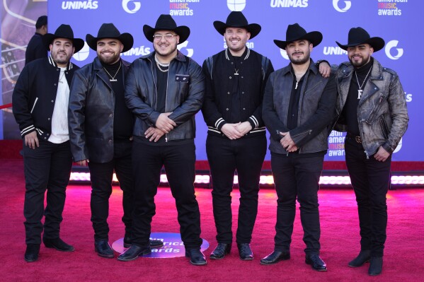 FILE - Grupo Frontera arrives at the Latin American Music Awards in Las Vegas on April 20, 2023. Regional Mexican music has become a global phenomenon, topping music charts, breaking streaming records and reaching new audiences as it crosses borders. Their sophomore album “Jugando Que No Pasa Nada" releases on Friday. (AP Photo/John Locher, File)