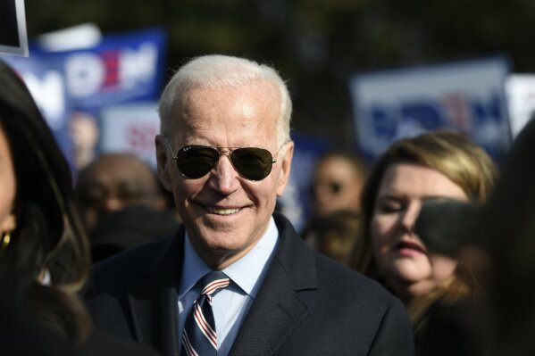 Democratic presidential hopeful Joe Biden participates in a Dr. Martin Luther King Jr. Day march on Monday, Jan. 20, 2020, in Columbia, S.C. (AP Photo/Meg Kinnard)