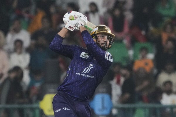 Quetta Gladiators Faheem Ashraf follows the ball after playing a shot for boundary during the Pakistan Super League first qualifier match between Islamabad United and Quetta Gladiators, in Lahore, Pakistan, Wednesday, May 21, 2025. (AP Photo/K.M. Chaudary)