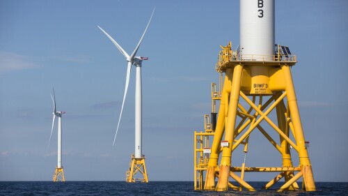 FILE - Three wind turbines stand in the water off Block Island, R.I, the nation's first offshore wind farm, Aug. 15, 2016. The first auction of offshore leases for wind power development in the Gulf of Mexico off the Louisiana and Texas coasts will be held Tuesday, Aug. 29, 2023, the Biden administration announced Thursday, July 20. (AP Photo/Michael Dwyer, File)