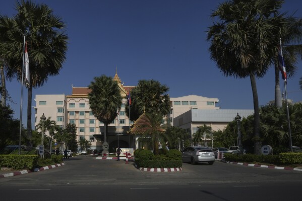 A main entrance of Phnom Penh Hotel is pictured in Phnom Penh, Cambodia, Tuesday, April 30, 2024. The European Union and United Nations abruptly rescheduled the launch of an anti-human trafficking program this week after being confronted with questions on the choice of venue: a Phnom Penh hotel owned by a Cambodian tycoon who has another property that has been used by human traffickers. (AP Photo/Heng Sinith)