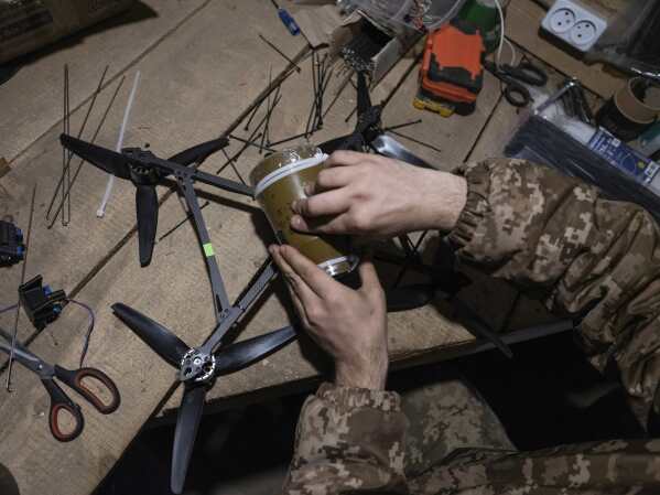 In this photo provided by Ukraine's 93rd Kholodnyi Yar Separate Mechanized Brigade press service, a soldier in a shelter gets ready to fire FPV drones towards Russian positions in a shelter in Kramatorsk direction, Donetsk region, Ukraine, Saturday, March 22, 2025. (Iryna Rybakova/Ukraine's 93rd Mechanized Brigade via AP)