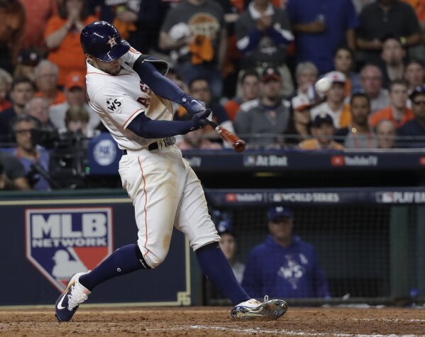 Houston Astros' Brian McCann rounds the bases after a home run off