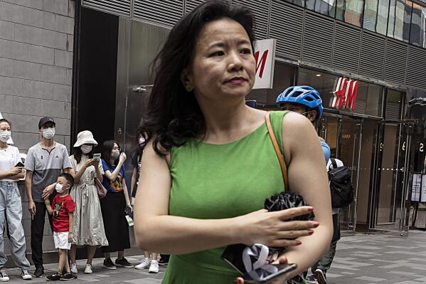 FILE - Cheng Lei, a Chinese-born Australian journalist attends a public event in Beijing on Aug. 12, 2020. The 47-rear-old journalist for CGTN, the English-language channel of China Central Television, has been detained in China since August 2019. (AP Photo/Ng Han Guan, File)