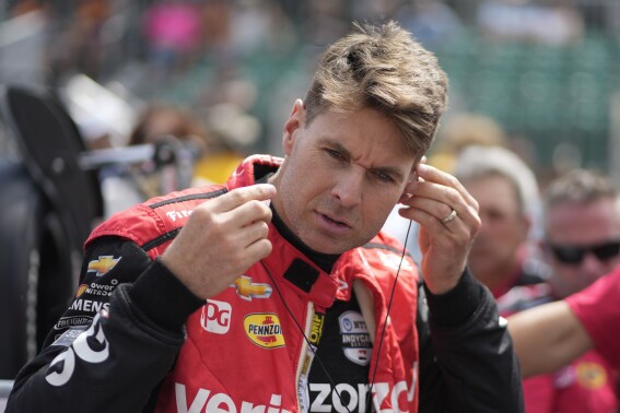 Will Power, of Australia, prepares to drive during qualifications for the Indianapolis 500 auto race at Indianapolis Motor Speedway, Saturday, May 18, 2024, in Indianapolis. (AP Photo/Darron Cummings)