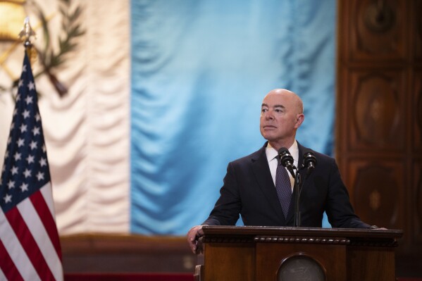 U.S. Homeland Security Secretary Alejandro Mayorkas takes part in a joint news conference with the Guatemalan president, at the National Palace in Guatemala City, Thursday, March 21, 2024. Mayorkas said at the conference that a Texas law giving state authorities the power to arrest and deport migrants who have entered the country illegally is unconstitutional. (AP Photo/Santiago Billy)