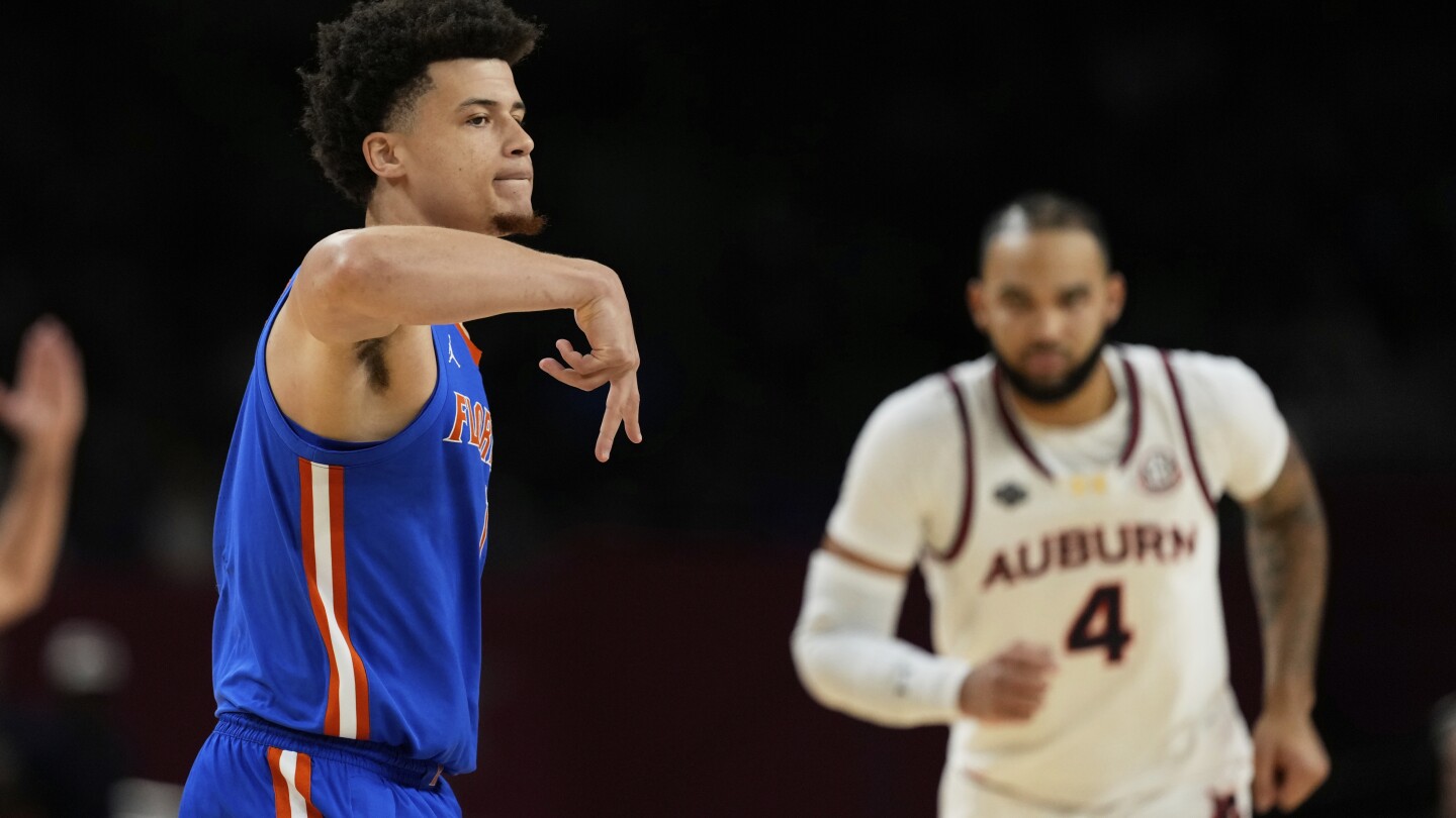 Florida' Clayton delivers again to outduel Auburn's Broome in Final Four matchup of All-Americans
