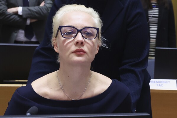 Yulia Navalnaya, wife of Russian opposition leader Alexei Navalny, addresses a meeting of EU foreign ministers at the European Council building in Brussels, Monday, Feb. 19, 2024. European Union foreign ministers on Monday will discuss, among other issues, the situation in the Middle East and Russian aggression against Ukraine. (Yves Herman, Pool Photo via AP)