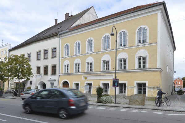 FILE - An exterior view of Adolf Hitler's birth house, front, in Braunau am Inn, Austria, on Sept. 27, 2012. Work started Monday Oct. 2, 2023 on turning the house where Adolf Hitler was born in 1889 into a police station, a project meant to make it unattractive as a site of pilgrimage for people who glorify the Nazi dictator. (AP Photo / Kerstin Joensson, File)