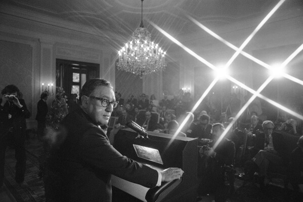 FILE - U.S. Secretary of State Henry Kissinger faces international press at a news conference in Schloss Klessheim in Salzburg, June 11, 1974. Kissinger, the diplomat with the thick glasses and gravelly voice who dominated foreign policy as the United States extricated itself from Vietnam and broke down barriers with China, died Wednesday, Nov. 29, 2023. He was 100. (AP Photo, File)