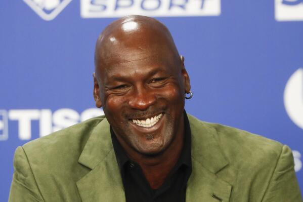 FILE - Basketball legend Michael Jordan speaks during a press conference ahead of an NBA basketball game between the Charlotte Hornets and Milwaukee Bucks in Paris, Jan. 24, 2020. Jordan is celebrating his 60th birthday on Friday, Feb. 17, 2023, by making a $10 million donation to Make-A-Wish America. It is the largest donation ever received from an individual in the organization’s 43-year history. (AP Photo/Thibault Camus, File)