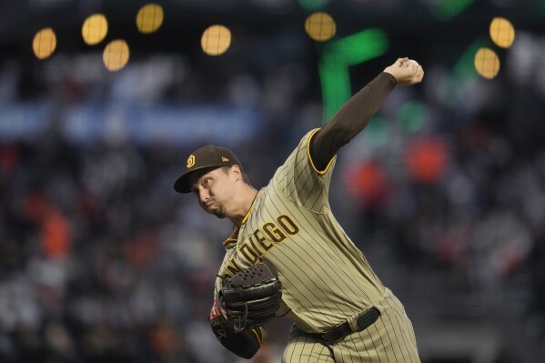 San Diego Padres pitcher Blake Snell works against the San Francisco Giants during the first inning of a baseball game in San Francisco, Monday, Sept. 25, 2023. (AP Photo/Jeff Chiu)
