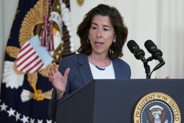 FILE - Commerce Secretary Gina Raimondo speaks during an event about high-speed internet infrastructure, in the East Room of the White House on June 26, 2023, in Washington. Raimondo is the latest member of President Joe Biden’s Cabinet to visit China as his administration tries to mend the deteriorating ties between the world's two largest economies. She promises to be “practical” without compromising the U.S. push to “responsibly” manage that economic relationship. (AP Photo/Evan Vucci, File)