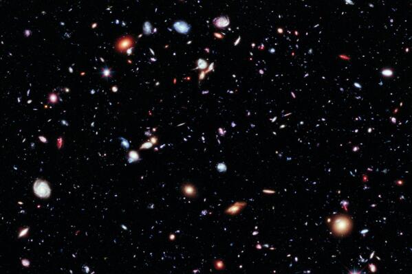 This image made available by the European Space Agency shows thousands of galaxies captured by the Hubble Space Telescope in observations from 2002-2009. In a report issued Thursday, Nov. 4, 2021 by the National Academy of Sciences, Engineering and Medicine, a U.S. survey of astronomers puts the search for extraterrestrial life at the top of their to-do list for the next 10 years. (NASA, ESA, G. Illingworth, D. Magee, and P. Oesch (University of California, Santa Cruz), R. Bouwens (Leiden University), and the HUDF09 Team via AP)