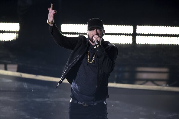 Eminem performs "Lose Yourself" at the Oscars on Sunday, Feb. 9, 2020, at the Dolby Theatre in Los Angeles. (AP Photo/Chris Pizzello)