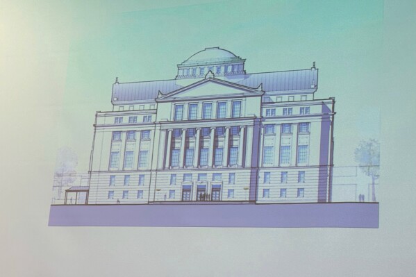 Alabama lawmakers are shown architectural drawings of what a new Alabama Statehouse will look like when it is complete in 2027 during a meeting of the Alabama Legislative Council in Montgomery, Ala. on Wednesday, May 1, 2024. The project also includes a new parking deck and a green space where the current building is located (AP Photo/Kim Chandler)