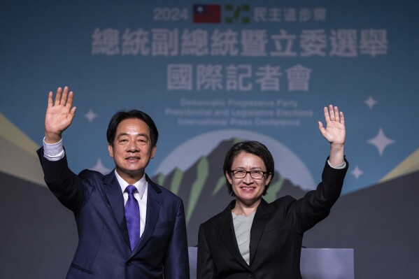 Taiwanese Vice President Lai Ching-te, also known as William Lai, left, celebrates his victory with running mate Bi-khim Hsiao in Taipei, Taiwan, Saturday, Jan. 13, 2024. Lai Ching-te emerged victorious in Taiwan’s presidential election on Saturday and his opponents conceded, a result that will chart the trajectory of the self-ruled democracy’s relations with China over the next four years. (AP Photo/Louise Delmotte)
