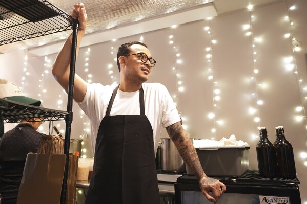 Chef Phila Lorn talks ahead of his restaurant Mawn opening for lunch in Philadelphia, Thursday, May 22, 2025. (AP Photo/Matt Rourke)