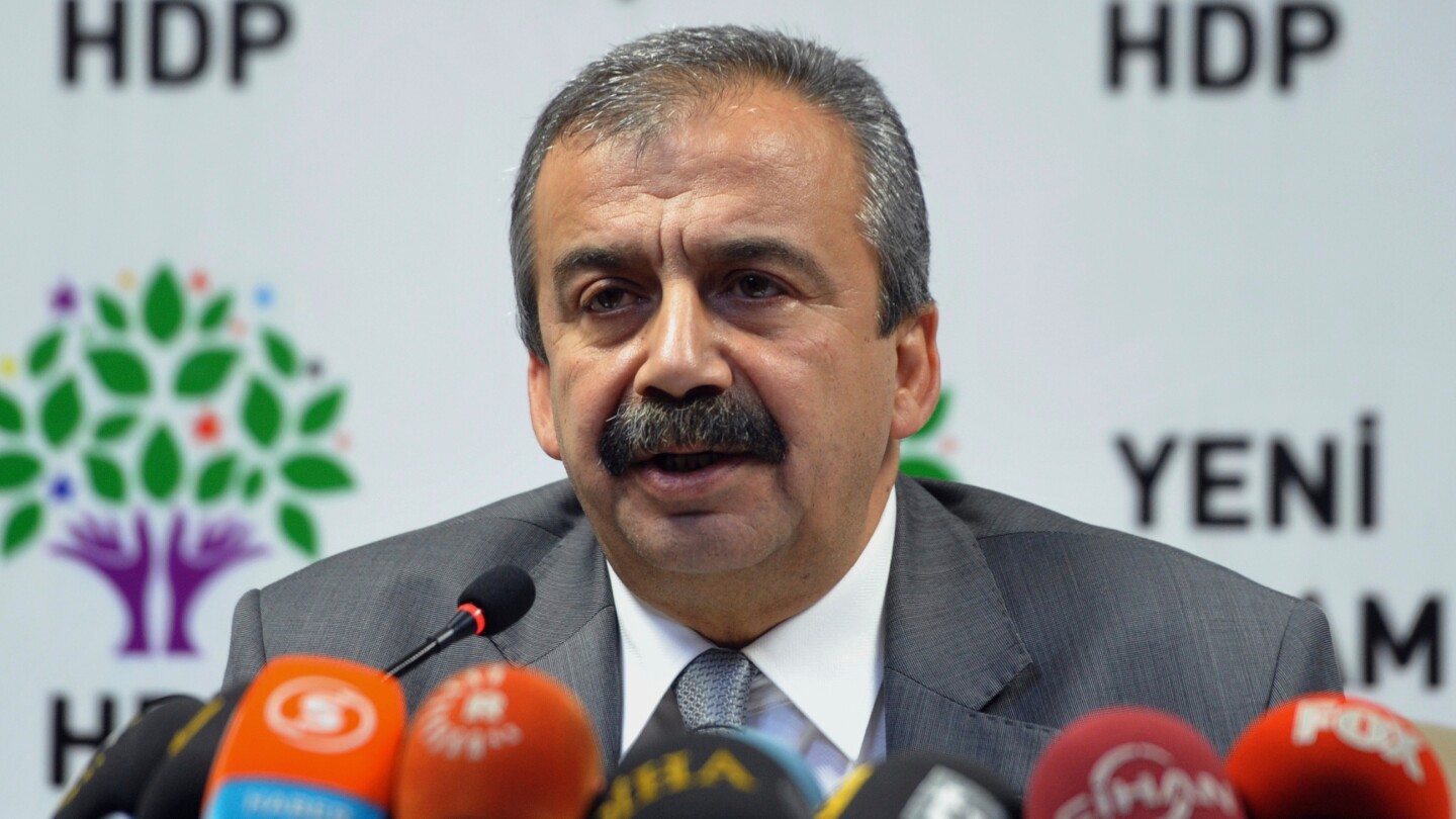 A Turkish politician at the center of efforts to end 40-year Kurdish conflict dies at 62