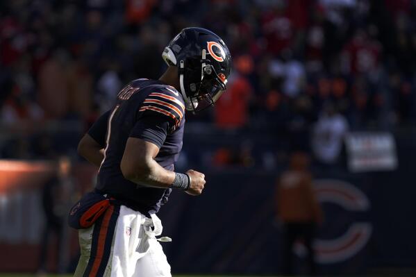 Chicago Bears quarterback Justin Fields walks off the field after throwing a late fourth quarter interception in an NFL football game against the San Francisco 49ers Sunday, Oct. 31, 2021, in Chicago. The 49ers won 33-22. (AP Photo/Nam Y. Huh)