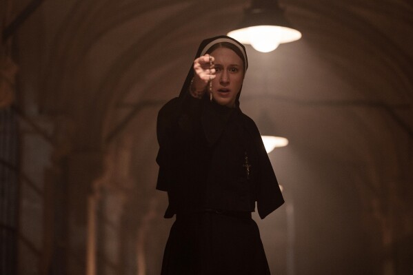 FILE - This image provided by Warner Bros. Pictures shows Taissa Farmiga as Sister Irene in New Line Cinema's horror thriller "The Nun II." (Bruno Calvo/Warner Bros. Pictures via AP, File)