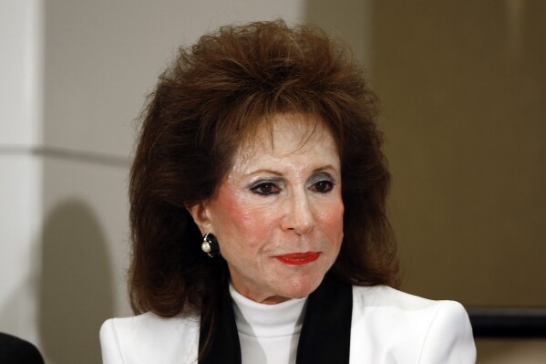 FILE - Florine Mark, President and CEO of The WW Group, Inc. is shown in Detroit Tuesday, Sept. 29, 2015. Mark, a Michigan business icon and former owner of Weight Watchers franchises in Michigan and Ontario, Canada, has died. (AP Photo/Paul Sancya, File)