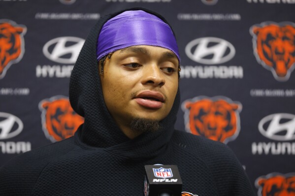 Chicago Bears quarterback Justin Fields speaks during a news conference after an NFL football game against the Minnesota Vikings, Monday, Nov. 27, 2023, in Minneapolis. The Bears won 12-10. (AP Photo/Bruce Kluckhohn)