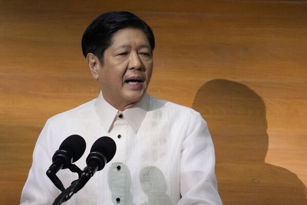 Philippine President Ferdinand Marcos Jr. delivers his second state of the nation address at the House of Representatives in Quezon City, Philippines on Monday, July 24, 2023. (AP Photo/Aaron Favila)