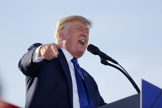 Former President Donald Trump speaks at a rally at the Delaware County Fairgrounds, Saturday, April 23, 2022, in Delaware, Ohio, to endorse Republican candidates ahead of the Ohio primary on May 3. (AP Photo/Joe Maiorana)