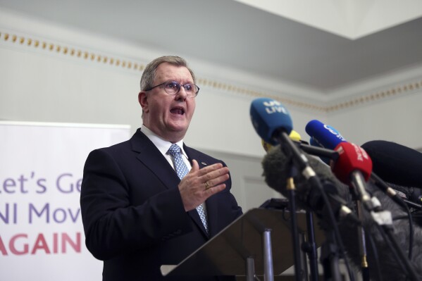 Democratic Unionist Party (DUP) leader Jeffrey Donaldson speaks to the media during a press conference at Hinch Distillery, Temple, Northern Ireland, Tuesday, Jan. 30, 2024. The Unionist leader met with his executive members who have agreed to endorse a deal and restore power sharing in Northern Ireland. (AP Photo/Peter Morrison)