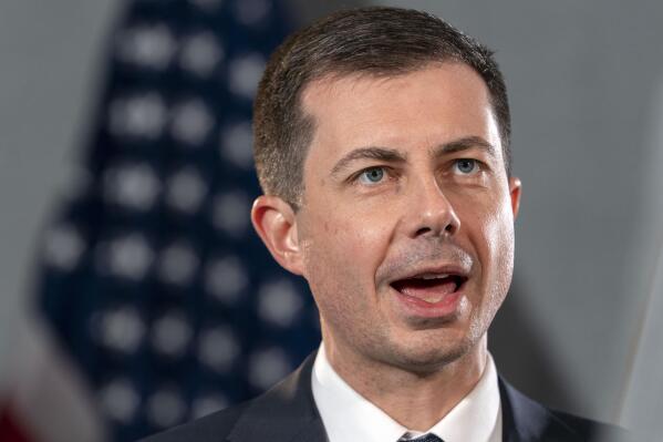 Transportation Secretary Pete Buttigieg is interviewed, Wednesday, May 10, 2023, at the Department of Transportation in Washington. Buttigieg says Tesla shouldn’t call its partially automated driving system Autopilot because the cars can’t drive themselves. T(AP Photo/Jacquelyn Martin)
