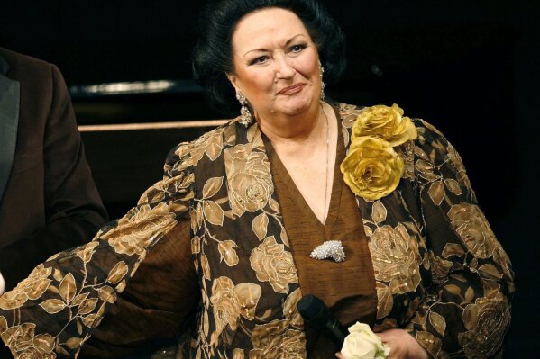 
              FILE - In this Nov. 17, 2006, file photo, Spanish soprano Montserrat Caballe, with Swiss moderator Kurt Aeschbacher, not in photo, welcomes the public on the occasion of the celebration of her 50th stage anniversary in Basel, Switzerland. Montserrat Caballe, a Spanish opera singer renowned for her bel canto technique and her interpretations of the roles of Rossini, Bellini and Donizetti, has died. She was 85. Hospital Sant Pau spokesman Abraham del Moral confirmed her death early Saturday, Oct. 6, 2018,  to The Associated Press.(Georgios Kefalas/Keystone via AP, File)
            