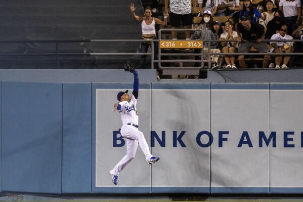 Los Angeles Dodgers center fielder Trayce Thompson looks on during