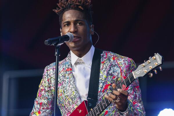 FILE - Jon Batiste performs during the Global Citizen festival on Sept. 25, 2021 in New York. Batiste received 11 Grammy Award nominations, including ones for album of the year, record of the year, and best R&B album. (AP Photo/Stefan Jeremiah, File)