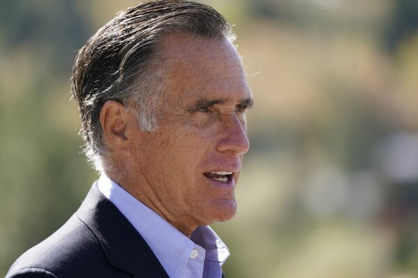 Sen. Mitt Romney, R-Utah,  speaks during a news conference Thursday, Oct. 15, 2020, near Neffs Canyon, in Salt Lake City. Romney announced legislation to establish a national wildfire commission that would make policy recommendations aimed at diminishing future wildfire disasters. (AP Photo/Rick Bowmer)