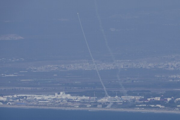 Israeli Iron Dome air defense system fires to intercept rockets that were launched from Lebanon, in northern Israel, Tuesday, Sept. 24, 2024. (AP Photo/Ohad Zwigenberg)