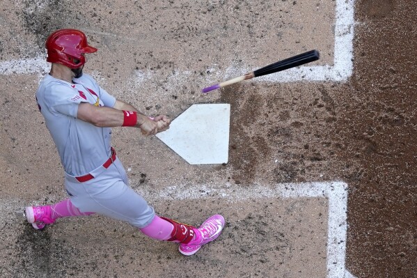 St. Louis Cardinals' Matt Carpenter breaks his bat as he fouls a pitch during the fourth inning of a baseball game against the Milwaukee Brewers Sunday, May 12, 2024, in Milwaukee. (AP Photo/Morry Gash)
