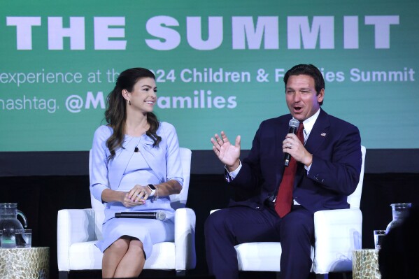 Florida first lady Casey DeSantis listens to Gov. Ron DeSantis during a panel discussion at the 2024 Florida Children and Families Summit at the JW Marriott Grand Lakes in Orlando, Fla., Wednesday, Sept. 4, 2024. (Joe Burbank/Orlando Sentinel via AP, File)