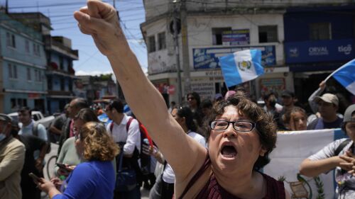 Protestors gather outside the Attorney General's office to protest its raid on the nation's electoral authority and in favor of the election results that called for a run-off presidential election in Guatemala City, Thursday, July 13, 2023. The Attorney General's Office announced on July 12 that a judge had suspended the legal status of the Seed Movement party, for alleged violations when it gathered the necessary signatures to form. The party's presidential candidate had been set to compete in a runoff election on Aug. 20. (AP Photo/Moises Castillo)