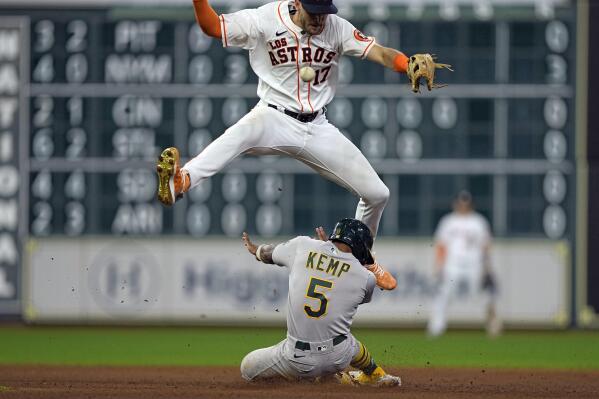 Brown drives in four runs to help A's rally past Astros 8-5