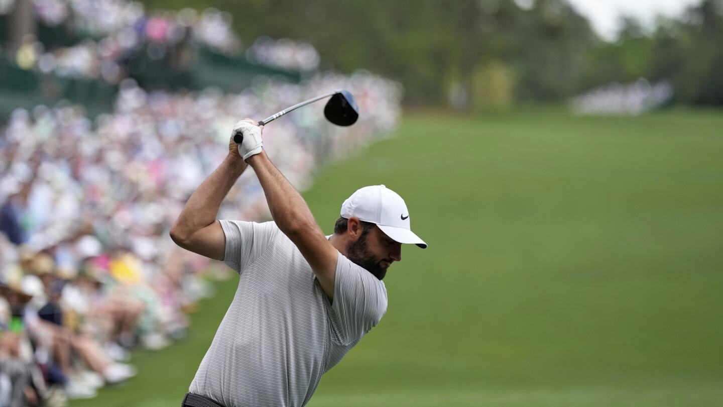 Scottie Scheffler begins his pursuit of a third green jacket with a 68 at the Masters