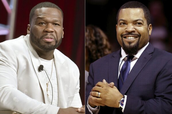 Curtis "50 Cent" Jackson participates in the Starz "Power" panel at the Television Critics Association Summer Press Tour in Beverly Hills, Calif., on July 26, 2019, left, and BIG3 League founder Ice Cube at the debut of the BIG3 Basketball League in New York on June 25, 2017. An altered photo of the rappers in hats that appear to show support for President Donald Trump circulated widely on social media Tuesday, fueled in part by a tweet by Eric Trump. The manipulated image was shared thousands of times on Twitter and Facebook since it began gaining attention on Monday.  (AP Photo)