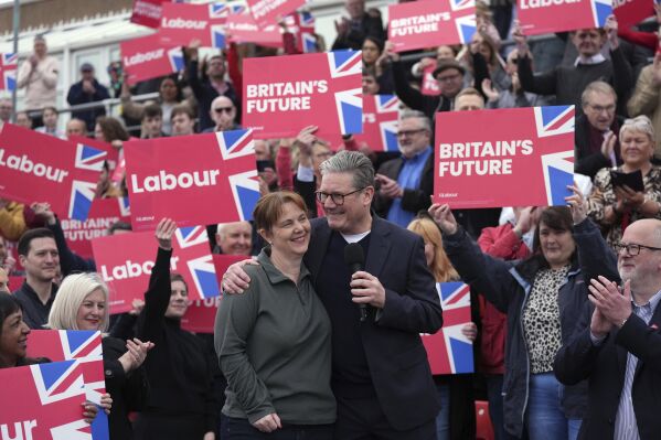Britain's Labour Party leader Sir Keir Starmer with newly elected East Midlands mayor Claire Ward during a visit to Forest Town Arena in Mansfield, England, Saturday May 4, 2024. (Jacob King/PA via AP)