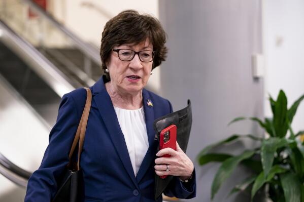 FILE - Sen. Susan Collins, R-Maine, speaks to reporters on Wednesday, May 4, 2022, amid the fallout from a leaked draft Supreme Court opinion that could overturn the landmark Roe v. Wade ruling, at the Capitol in Washington. Collins was blasted Friday, June 24, 2022, for the Supreme Court ruling allowing states to ban abortion because she voted to confirm two of the justices who were in the majority opinion. A critic called the fate of Roe v. Wade, Collins' "legacy" since she voted to confirm Justices Neil Gorsuch and Brett Kavanaugh to the high court. (AP Photo/J. Scott Applewhite, File)