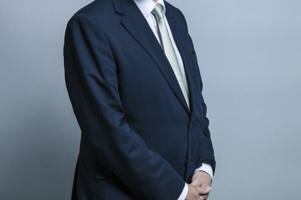 This undated photo issued by UK Parliament shows former minister Chris Skidmore. Britain’s former energy minister said Friday Jan. 5, 2024, he is quitting the Conservative Party and stepping down as a lawmaker over the government’s backtracking on its environmental commitments. (Chris McAndrew/UK Parliament via AP)